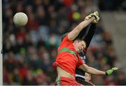 17 March 2013; Dean Rock, Ballymun Kickhams, beats St Brigid's goalkeeper Shane Curran to score his side's first goal. AIB GAA Football All-Ireland Senior Club Championship Final, Ballymun Kickhams, Dublin, v St Brigid's, Roscommon. Croke Park, Dublin. Picture credit: Stephen McCarthy / SPORTSFILE