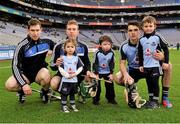 16 March 2013; Match day mascots from left, Deirbhla McNally, age 2, Donal Redmond, age 5, and Cathal Kettle, age 8, with Dublin players, from left, Shane Durkin, John McCaffrey, and Daniel Sutcliffe lead out the Dublin team. Allianz Hurling League, Division 1A, Dublin v Limerick, Croke Park, Dublin. Picture credit: Pat Murphy / SPORTSFILE