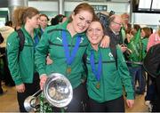 18 March 2013; Ireland captain Fiona Coghlan and team-mate Lynne Cantwell with the RBS Women's Six Nations Championship trophy on their arrival home from the Women's 6 Nations Rugby Championship. Terminal 2, Dublin Airport, Dublin. Picture credit: Brendan Moran / SPORTSFILE