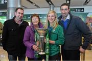 18 March 2013; Ireland's Siobhan Fleming, with her mother Joan and brothers James, left, and David and the RBS Women's Six Nations Championship trophy on their arrival home from the Women's 6 Nations Rugby Championship. Terminal 2, Dublin Airport, Dublin. Picture credit: Brendan Moran / SPORTSFILE
