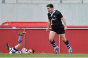 18 March 2013; JJ O'Neill, Crescent College Comprehensive, celebrates after scoring his side's first try despite the efforts of Ben Riley, Rockwell College. Munster Schools Senior Cup Final, Crescent College Comprehensive v Rockwell College, Thomond Park, Limerick. Picture credit: Diarmuid Greene / SPORTSFILE