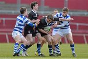 18 March 2013; James Frawley, Crescent College Comprehensive, supported by team-mate Jason O'Sullivan, is tackled by David O'Mahony, left, and Aidan Moynihan, Rockwell College. Munster Schools Senior Cup Final, Crescent College Comprehensive v Rockwell College, Thomond Park, Limerick. Picture credit: Diarmuid Greene / SPORTSFILE