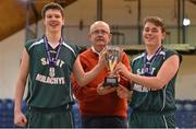 19 March 2013; Joe O'Boyle, left, and Michael Gorman, St. Malachy’s Belfast, are presented with the cup by Joe Shields. All-Ireland Schools League 2013, U19A Boy's Final, Presentation College Bray, Wicklow v St. Malachy’s Belfast, Antrim, National Basketball Arena, Tallaght, Dublin. Picture credit: Brendan Moran / SPORTSFILE