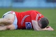 16 March 2013; Colm O'Neill, Cork, lies on the pitch after picking up an injury. Allianz Football League, Division 1, Cork v Donegal, Pairc Ui Rinn, Cork. Picture credit: Diarmuid Greene / SPORTSFILE