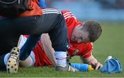 16 March 2013; Colm O'Neill, Cork, receives treatment on the the pitch after picking up an injury. Allianz Football League, Division 1, Cork v Donegal, Pairc Ui Rinn, Cork. Picture credit: Diarmuid Greene / SPORTSFILE