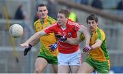 16 March 2013; Colm O'Neill, Cork, in action against Neil McGee, left, and Paddy McGrath. Allianz Football League, Division 1, Cork v Donegal, Pairc Ui Rinn, Cork. Picture credit: Diarmuid Greene / SPORTSFILE