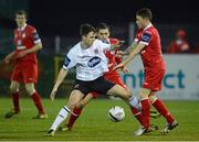 19 March 2013; John Dillon, Dundalk, in action against Seamus Conneely and Lee Lynch, Sligo Rovers. Airtricity League Premier Division, Dundalk v Sligo Rovers, Oriel Park, Dundalk, Co. Louth. Picture credit: Oliver McVeigh / SPORTSFILE