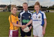20 March 2013; St Paul's High School captain Shauna Finnegan, left, and Glenamaddy Community School captain Louise Ward exchange a handshake in the company of referee Paul Fahy before the game. Tesco HomeGrown Post Primary School Junior A Final, Glenamaddy Community School, Co. Galway v St Paul's High School, Co. Armagh, Glenamaddy GAA Club, Galway. Picture credit: Diarmuid Greene / SPORTSFILE