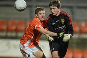 20 March 2013; Michael Cunningham, Down, in action against Simon McCoy, Armagh. Cadbury Ulster GAA Football Under 21 Championship, Quarter-Final, Armagh v Down, Athletic Grounds, Armagh. Picture credit: Oliver McVeigh / SPORTSFILE