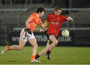 20 March 2013; Danny Savage, Down, in action against Patrick Burns, Armagh. Cadbury Ulster GAA Football Under 21 Championship, Quarter-Final, Armagh v Down, Athletic Grounds, Armagh. Picture credit: Oliver McVeigh / SPORTSFILE