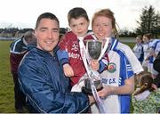 20 March 2013; Glenamaddy Community School captain Louise Ward along with manager John Kennedy and his son Conor, aged 5, after the game. Tesco HomeGrown Post Primary School Junior A Final, Glenamaddy Community School, Co. Galway v St Paul's High School, Co. Armagh, Glenamaddy GAA Club, Galway. Picture credit: Diarmuid Greene / SPORTSFILE