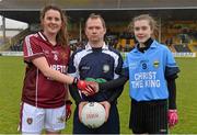 21 March 2013; Loreto St. Michael’s captain Aisling Cassidy, left, and Christ the King captain Amy Curtin exchange a handshake in the company of referee Garryowen McMahon before the game. Tesco HomeGrown Post Primary School Junior C Final, Christ the King, Douglas, Cork v Loreto St. Michael’s, Navan, Co. Meath. Nowlan Park, Kilkenny. Picture credit: Diarmuid Greene / SPORTSFILE