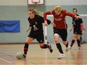 22 March 2013; Yvonne Cahill, UCC, in action against Lyndsey Galgey, Carlow IT. WSCAI National Futsal semi-final, UCC v Carlow IT, Gormanston College, Co. Meath. Photo by Sportsfile