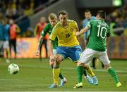 22 March 2013; Zlatan Ibrahimovic, Sweden, in action against James McClean and Robbie Keane, right, Republic of Ireland. 2014 FIFA World Cup Qualifier, Group C, Sweden v Republic of Ireland, Friends Arena, Solna, Stockholm, Sweden. Picture credit: David Maher / SPORTSFILE