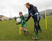 23 March 2013; Kerry footballer Colm Cooper in action against Charlie Byrne during the AIB GAA Skills Day event at Balltinglass GAA Club. AIB, proud sponsors of the GAA Club Championships, joined up with the Wicklow junior football and hurling players to celebrate the club’s county success and acknowledge the role which the club plays in the community by supporting them in hosting the AIB GAA Skills event. Balltinglass GAA Club, Baltinglass, Co. Wicklow. Picture credit: Pat Murphy / SPORTSFILE