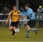 23 March 2013; Alan Duffy, Ballinasloe, in action against Mark Mooney, Killbarrack. Aviva Umbro FAI Junior Cup Quarter-Final, Ballinasloe v Killbarrack, Curragh Grounds, Ballinasloe, Co. Galway. Picture credit: Ray Ryan / SPORTSFILE