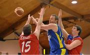 23 March 2013; Pat Glover, DCU Saints, in action against Niall O'Reilly, left, and Daniel O'Sullivan, UCC Demons. National Champions Trophy Final, UCC Demons v DCU Saints, National Basketball Arena, Tallaght, Dublin. Picture credit: Brendan Moran / SPORTSFILE