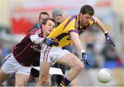 24 March 2013; Rory Quinlivan, Wexford, in action against John O Brien, Galway. Allianz Football League, Division 2, Galway v Wexford, Pearse Stadium, Galway. Picture credit: Ray Ryan / SPORTSFILE