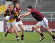 24 March 2013; P.J. Banville, Wexford, in action against Johnny Duane and Conor Doherty, Galway. Allianz Football League, Division 2, Galway v Wexford, Pearse Stadium, Galway. Picture credit: Ray Ryan / SPORTSFILE