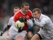 24 March 2013; Stephen O'Neill, Tyrone, in action against Peter Kelly, Kildare. Allianz Football League Division 1, Kildare v Tyrone, St Conleth's Park, Newbridge, Co. Kildare. Photo by Sportsfile