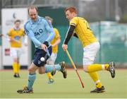 24 March 2013; Andy Ewington, Monkstown, in action against Michael O'Connor, Pembroke Wanderers. Irish Men's Senior Cup Final, Monkstown v Pembroke Wanderers, National Hockey Stadium, UCD, Belfield, Dublin. Picture credit: Ray Lohan / SPORTSFILE