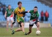 24 March 2013; Éamonn McGee, Donegal, in action against Cathal Carolan, Mayo. Allianz Football League, Division 1, Mayo v Donegal, Elverys MacHale Park, Castlebar, Co. Mayo. Picture credit: Stephen McCarthy / SPORTSFILE