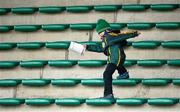 24 March 2013; Kerry supporter Jack Mangan, age 6, from Rylane, Co. Cork, makes his way down the seats in the main stand after the game. Allianz Football League, Division 1, Kerry v Cork, Austin Stack Park, Tralee, Co. Kerry. Picture credit: Brendan Moran / SPORTSFILE