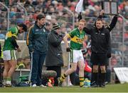 24 March 2013; Kerry manager Eamonn Fitzmaurice watches as Paul Galvin, left, and Colm Cooper prepare to come on as substitutes during the second half. Allianz Football League, Division 1, Kerry v Cork, Austin Stack Park, Tralee, Co. Kerry. Picture credit: Brendan Moran / SPORTSFILE