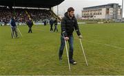 24 March 2013; Injured Cork players, Colm O'Neill, left, and Eoin Cadogan make their way across the pitch to the team dugouts before the game. Allianz Football League, Division 1, Kerry v Cork, Austin Stack Park, Tralee, Co. Kerry. Picture credit: Brendan Moran / SPORTSFILE