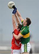 24 March 2013; Marc O Sé, Kerry, punches the ball clear of Daniel Goulding, Cork. Allianz Football League, Division 1, Kerry v Cork, Austin Stack Park, Tralee, Co. Kerry. Picture credit: Brendan Moran / SPORTSFILE