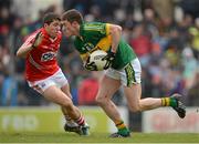 24 March 2013; Jonathan Lyne, Kerry, in action against Tomás Clancy, Cork. Allianz Football League, Division 1, Kerry v Cork, Austin Stack Park, Tralee, Co. Kerry. Picture credit: Brendan Moran / SPORTSFILE