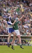 1 June 2003; Brian Begley, Limerick, in action against Waterford's Fergal Hartley. Guinness Munster Senior Hurling Championship, Limerick v Waterford, Semple Stadium, Thurles, Co. Tipperary. Picture credit; Brendan Moran / SPORTSFILE *EDI*