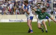 1 June 2003; Tony Browne, Waterford, in action against Limerick's Eoin Foley. Guinness Munster Senior Hurling Championship, Limerick v Waterford, Semple Stadium, Thurles, Co. Tipperary. Picture credit; Matt Browne / SPORTSFILE *EDI*