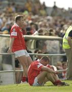 7 June 2003; Cork pair Colin Corkery, standing, and Brendan Jer O'Sullivan pictured on the side line after they had been sent off against Roscommon. Bank of Ireland Senior Football Championship qualifier, Roscommon v Cork, Dr Hyde Park, Roscommon. Picture credit; Matt Browne / SPORTSFILE *EDI*