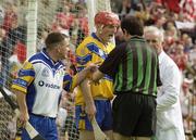 8 June 2003; Clare's Brian Lohan remonstrates with referee Willie Barrett after he awarded a controversial goal scored by Cork's Stanta O'hAilpin. Guinness Munster Senior Hurling Championship, Cork v Clare, Semple Stadium, Thurles, Co. Tipperary. Picture credit; Pat Murphy / SPORTSFILE *EDI*