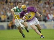 8 June 2003; Wexford's Michael Jordan in action against Offaly's Colm Cassidy. Guinness Leinster Senior Hurling Championship, Offaly v Wexford, Nowlan Park, Kilkenny. Picture credit; Damien Eagers / SPORTSFILE *EDI*