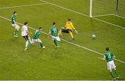26 March 2013; Austria's Martin Harnik shoots past Republic of Ireland goalkeeper David Forde to score his side's first goal, despite the attempts of, from left, Seamus Coleman, James McCarthy, Ciaran Clark and John O'Shea. 2014 FIFA World Cup Qualifier, Group C, Republic of Ireland v Austria, Aviva Stadium, Lansdowne Road, Dublin. Picture credit: Brendan Moran / SPORTSFILE