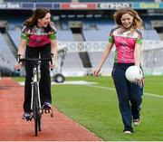 27 March 2013; A host of top GAA and Ladies Gaelic Football stars, along with 2012 World Track Cycling bronze medallist Caroline Ryan, joined forces in Croke Park today to officially launch the Race The Rás charity cycle. This is the third year of the race with almost 150 amateur cyclists and a host of current and former GAA stars lining up to bike across Ireland from May 19th to May 26th. All money raised will go to the National Breast Cancer Research Institute. For more information visit www.racetheras.com. In attendance are, 2012 World Track Cycling bronze medallist Caroline Ryan, left, and Dublin ladies football vice captain Sinead Finnegan. 2013 Race the Rás Charity Cycle Launch, Croke Park, Dublin. Picture credit: Brendan Moran / SPORTSFILE
