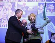 22 March 2013; John Keenan, Chairman of the Derry County Board, makes a presentation to Sabina Higgins, alongside the President of Ireland Michael D. Higgins, at the GAA Annual Congress 2013. The Venue, Limavady Road, Derry. Picture credit: Ray McManus / SPORTSFILE