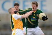 31 March 2013; Kevin Reilly, Meath, in action against Paddy Cunningham, Antrim. Allianz Football League, Division 3, Antrim v Meath, Casement Park, Belfast, Co. Antrim. Photo by Sportsfile