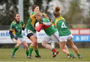 31 March 2013; Cora Staunton, Mayo, in action against Aedin Murray, left, Marie O'Shaughnessy and Orla Byrne, Meath. TESCO HomeGrown Ladies National Football League, Division 1, Round 6, Meath v Mayo, Boardsmill, Trim, Co. Meath. Picture credit: Brendan Moran / SPORTSFILE
