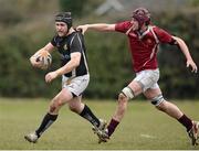 31 March 2013; Paul Gallogly, Longford, is tackled by Wesley Carter, Roscrea. Provincial Towns Cup, Semi-Final, Roscrea v Longford, Edenderry RFC, Edenderry, Co. Offaly. Picture credit: David Maher / SPORTSFILE