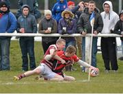 31 March 2013; Brian Geraghty, Tullamore, scores the first try against Tullow despite the tackle of Scott Calbeck. Provincial Towns Cup, Semi-Final, Tullow v Tullamore, Athy RFC, Athy, Co. Kildare. Picture credit: Matt Browne / SPORTSFILE
