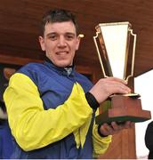 31 March 2013; Jockey Davy Condon holds up the Gold Cup after winning the the Powers Gold Cup on Realt Mor. Fairyhouse Racecourse, Co. Meath. Picture credit: Barry Cregg / SPORTSFILE