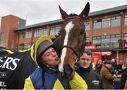 31 March 2013; Jockey Davy Condon with his mount Realt Mor in the winners enclosure after winning the Powers Gold Cup. Fairyhouse Racecourse, Co. Meath. Picture credit: Barry Cregg / SPORTSFILE