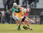 31 March 2013; Conor Carson, Antrim, in action against David Kenny, Offaly. Allianz Hurling League, Division 1B, Antrim v Offaly, Casement Park, Belfast, Co. Antrim. Photo by Sportsfile