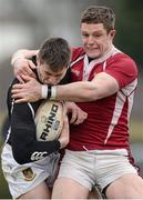 31 March 2013; Jody McDermott, Longford, is tackled by Aaron Carroll, Roscrea. Provincial Towns Cup, Semi-Final, Roscrea v Longford, Edenderry RFC, Edenderry, Co. Offaly. Picture credit: David Maher / SPORTSFILE