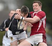 31 March 2013; Jody McDermott, Longford, is tackled by Aaron Carroll, Roscrea. Provincial Towns Cup, Semi-Final, Roscrea v Longford, Edenderry RFC, Edenderry, Co. Offaly. Picture credit: David Maher / SPORTSFILE