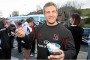 2 April 2013; Ulster's Chris Henry has some 'Ulster Rugby' flavoured ice cream by Lilley's Centra, Enniskillen, after squad training ahead of their Heineken Cup quarter-final against Saracens on Saturday. Ulster Rugby Squad Training, Enniskillen, Co. Fermanagh. Picture credit: John Dickson / SPORTSFILE