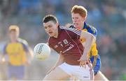 6 April 2013; Damien Comer, Galway, in action against Fintan Kelly, Roscommon. Cadbury Connacht GAA Football Under 21 Championship Final, Roscommon v Galway, Dr. Hyde Park, Roscommon. Picture credit: Stephen McCarthy / SPORTSFILE